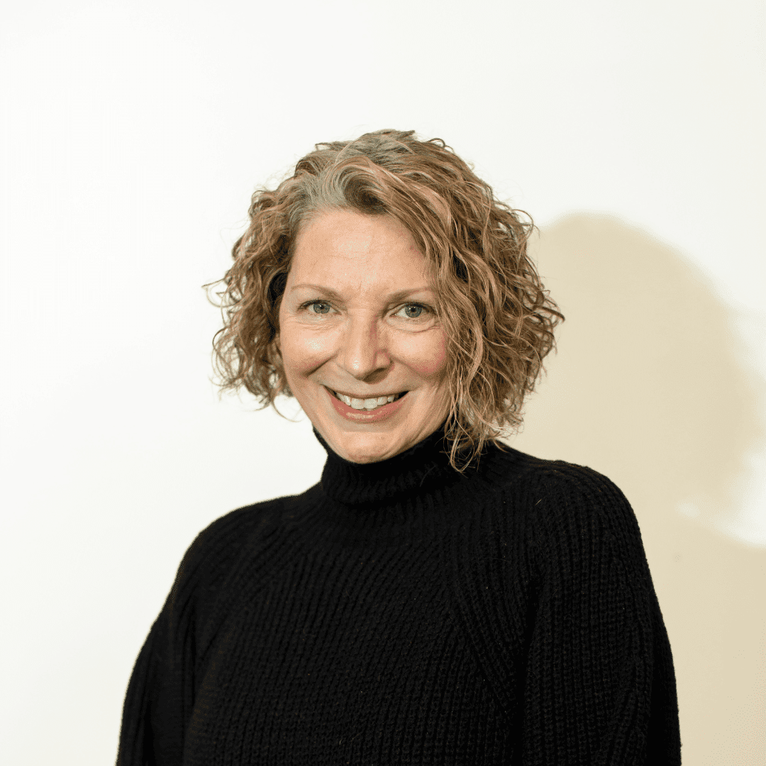 Portrait of Jill Hartmeyer, a professional stylist at Brown & DeLine Salon, showcasing their expertise and style.