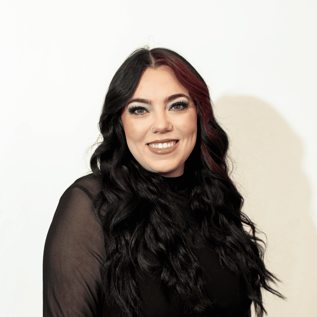 Portrait of Mackenzie Schoelles, a professional stylist at Brown & DeLine Salon, showcasing their expertise and style.