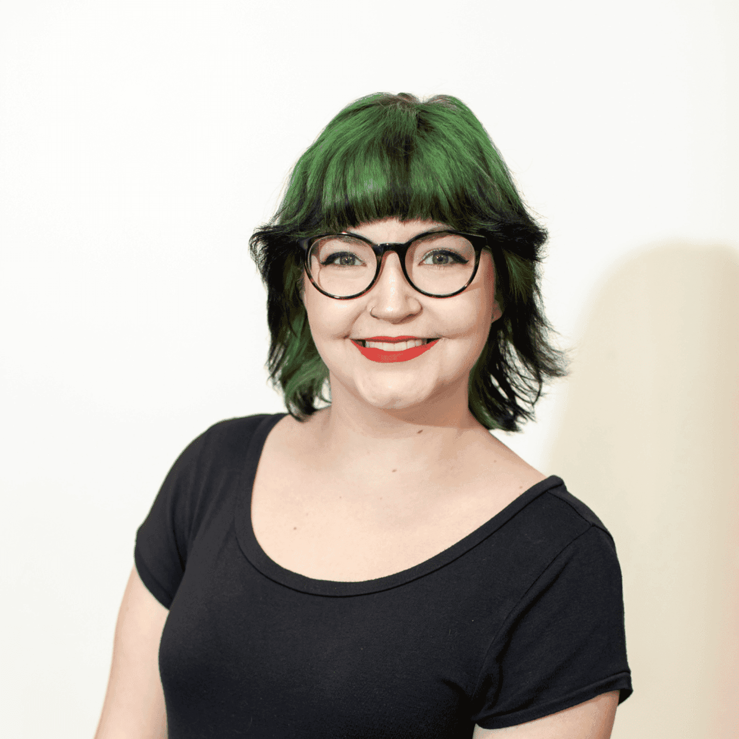 Portrait of Katie Lynn, a professional stylist at Brown & DeLine Salon, showcasing their expertise and style.