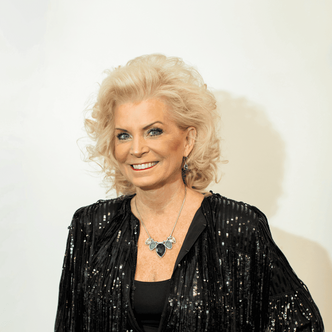 Portrait of Cathy Brown-Issel, a professional stylist at Brown & DeLine Salon, showcasing their expertise and style.