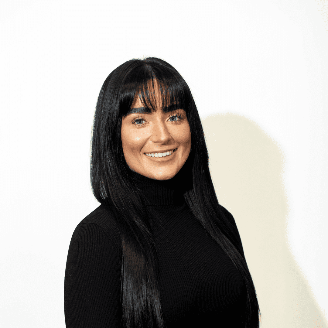 Portrait of Chloe Issel, a professional stylist at Brown & DeLine Salon, showcasing their expertise and style.