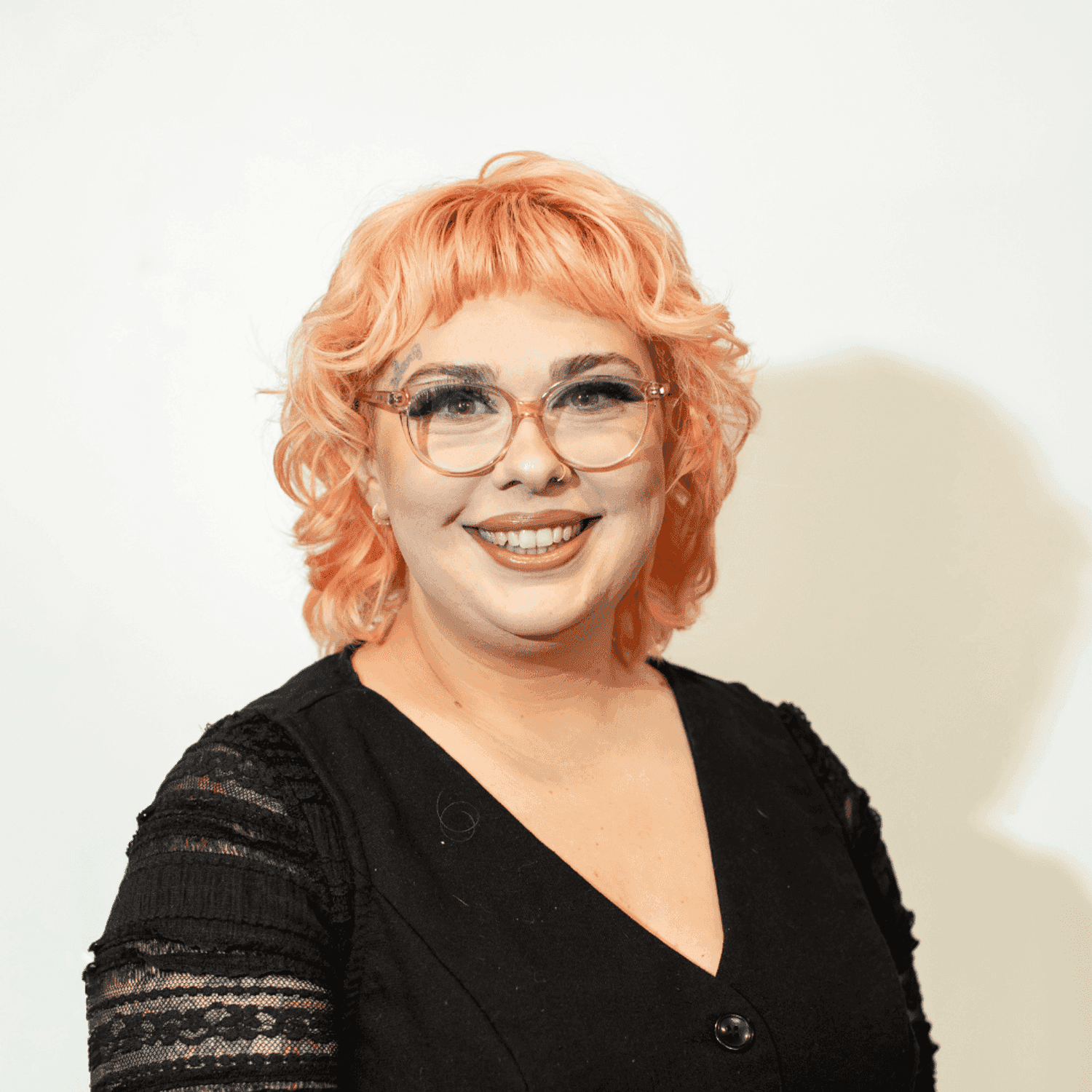 Portrait of Maddie Stannard, a professional stylist at Brown & DeLine Salon, showcasing their expertise and style.