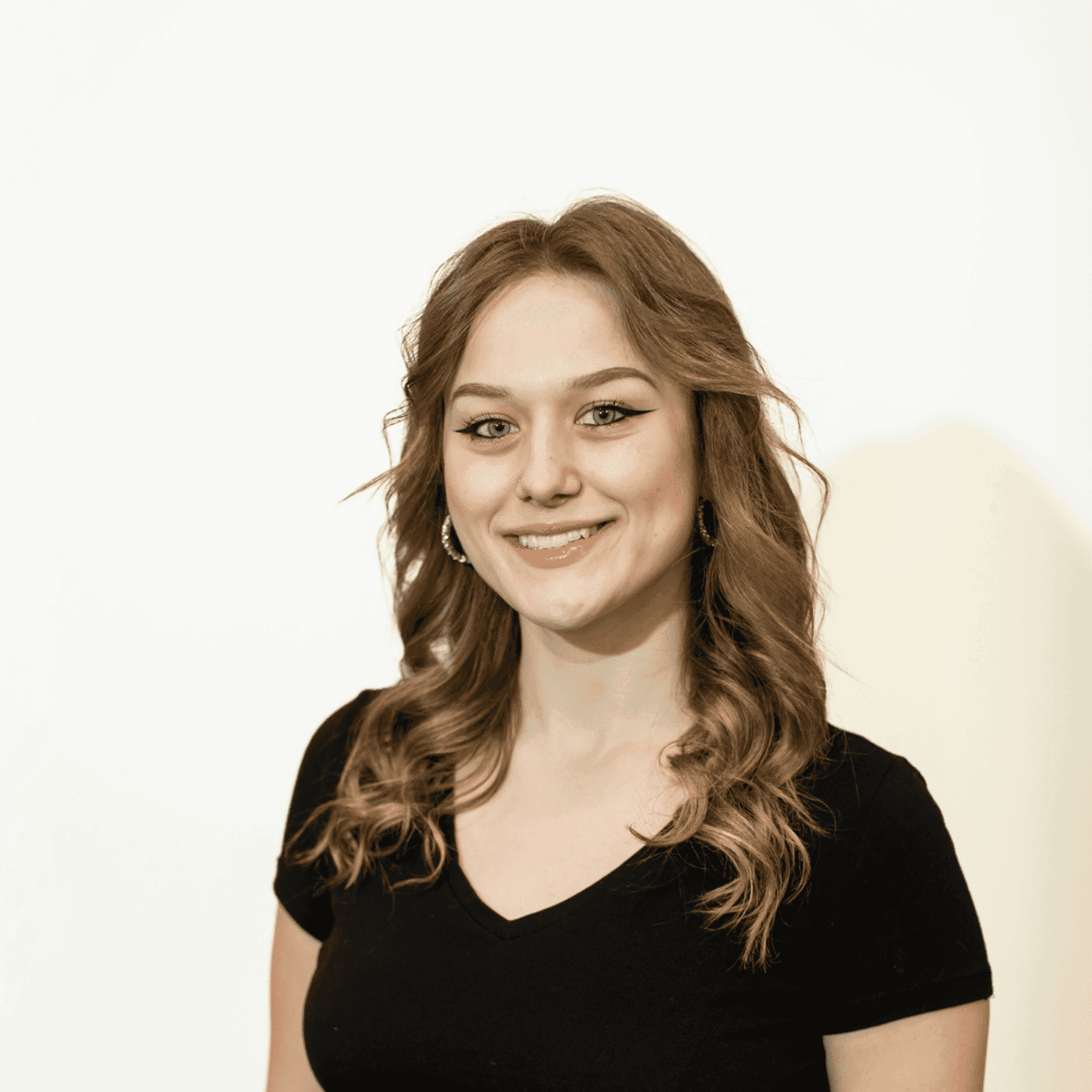 Portrait of Allie Richardson, a professional stylist at Brown & DeLine Salon, showcasing their expertise and style.