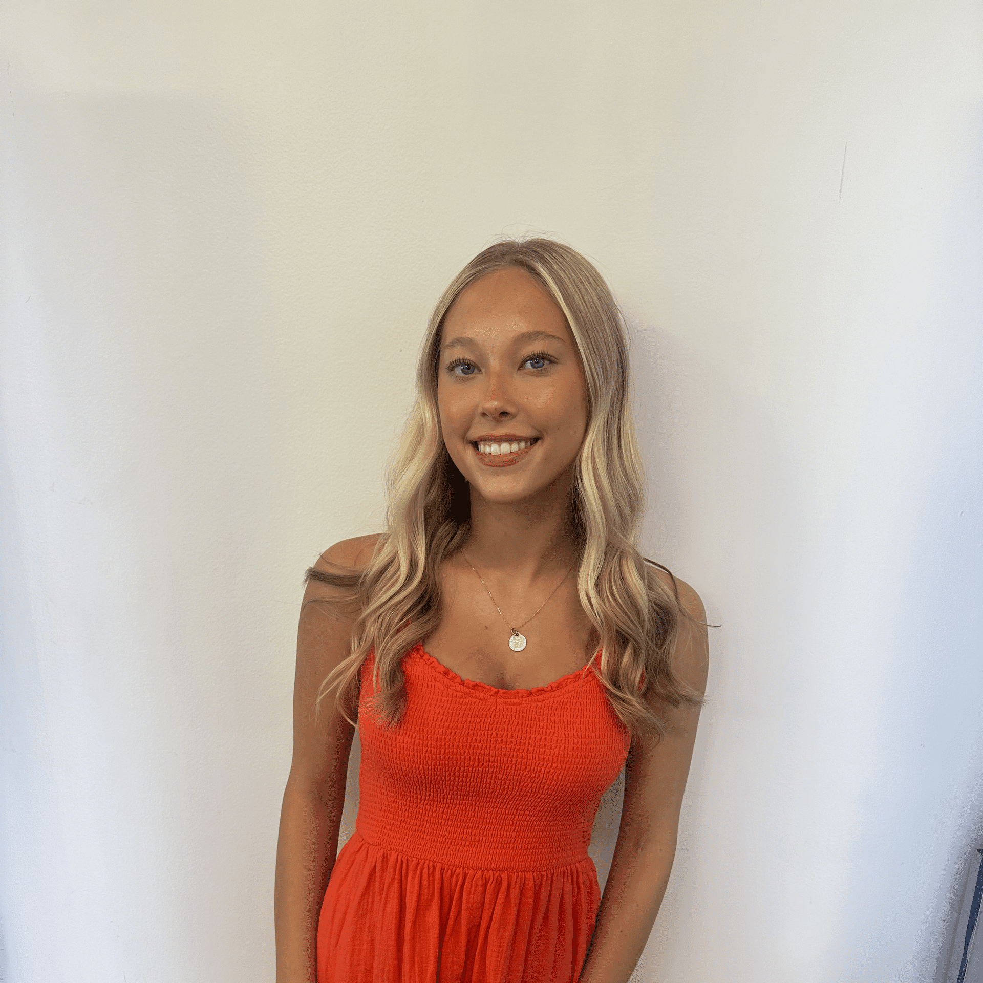 Portrait of Kendell, a professional stylist at Brown & DeLine Salon, showcasing their expertise and style.