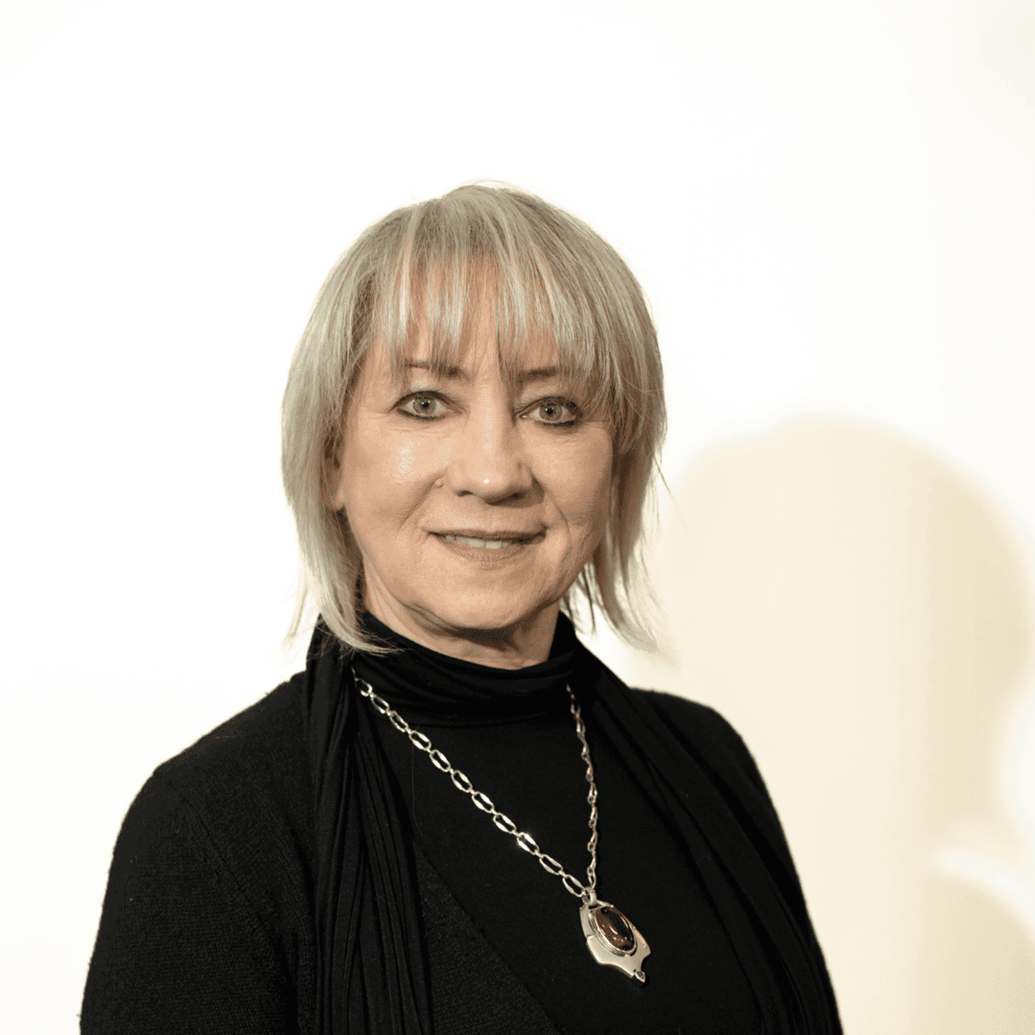 Portrait of Halina Matuszkiewicz, a professional stylist at Brown & DeLine Salon, showcasing their expertise and style.